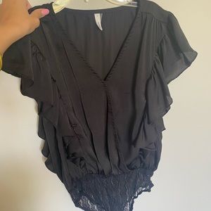 Black ruffled body suit